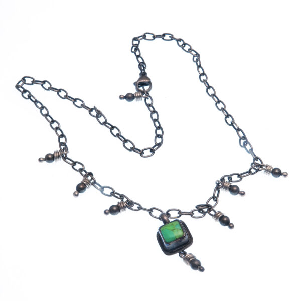 An exquisite pewter and turquoise chain necklace